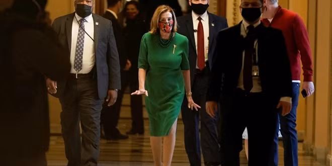 After months of inaction, U.S. Congress approves $892 billion COVID-19 relief package ảnh 1