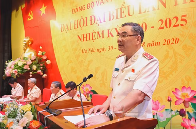 Major General To An Xo, Chief of Office of the Ministry of Public Security speaks at the event.
