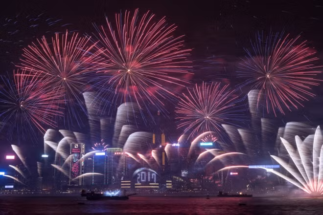 Firework explode over Victoria harbour during celebrations in Hongkong