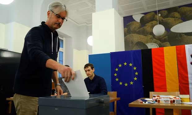 Voting in Berlin on Sunday. Photograph: Fabrizio Bensch/Reuters Voting in Berlin on Sunday. Photograph: Fabrizio Bensch/Reuters