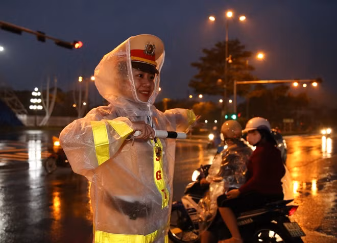 A female traffic police controlling traffic route. A female traffic police controlling traffic route.