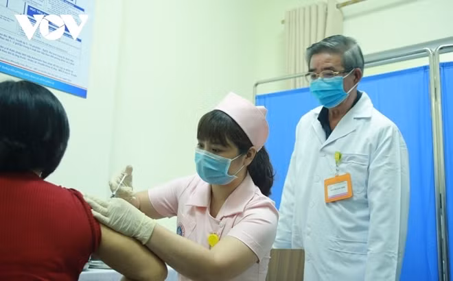A volunteer receives the second shot of COVIVAC vaccine