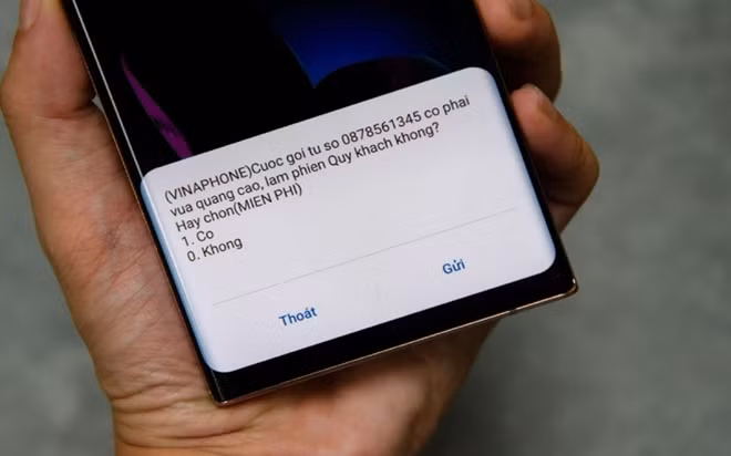 The Department of Telecommunications uses a message to warn spam calls and collect consumers' feedback. (Photo: Vinaphone)