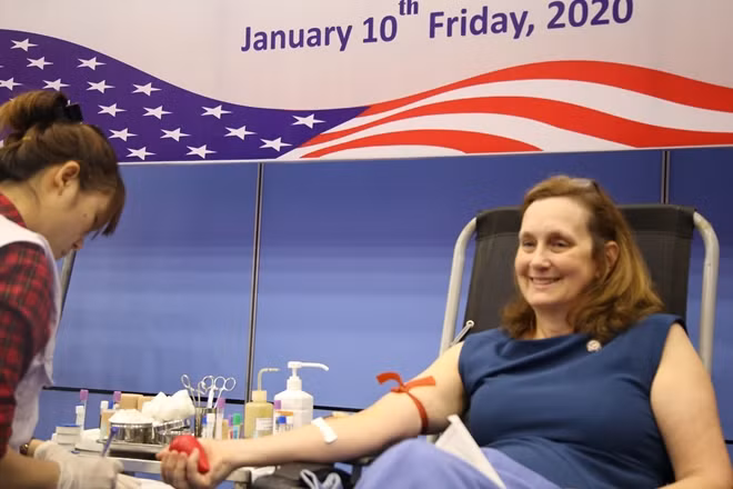 U.S. Embassy Deputy Chief of Mission Cary McClelland donates blood at the drive.