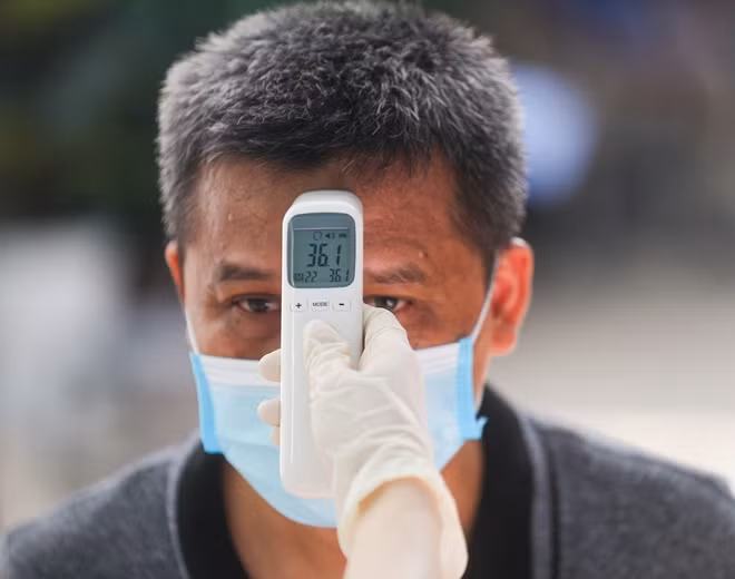 Before getting vaccinated, people had to have their temperature measured and blood pressure checked. Before getting vaccinated, people had to have their temperature measured and blood pressure checked.