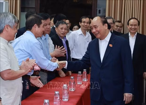 President Nguyen Xuan Phuc meets voters at the conference (Photo: VNA) President Nguyen Xuan Phuc meets voters at the conference (Photo: VNA)