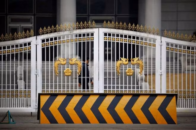 A man walks behind an entrance of the Presidential Blue House before South Korea's ousted leader Park Geun Hye leaves, in Seoul on March 12, 2017. PHOTO: REUTERS