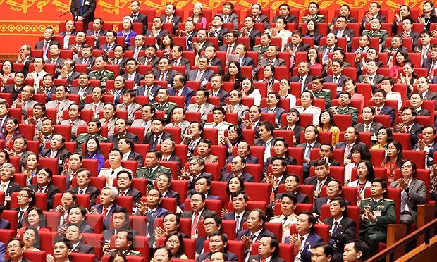 Congress delegates discuss documents on third working day hinh anh 1