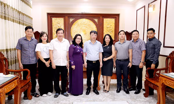 CAND Newspaper works with Hau Giang and Soc Trang Provinces -0