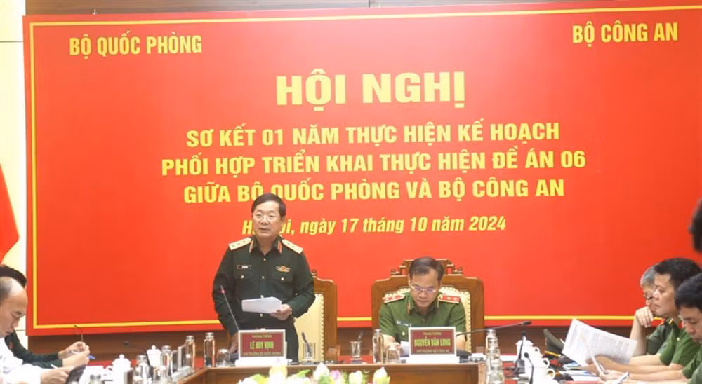 Ministry of Public Security, Ministry of National Defence review one-year of implementation of coordination plan to implement Project 06 -0