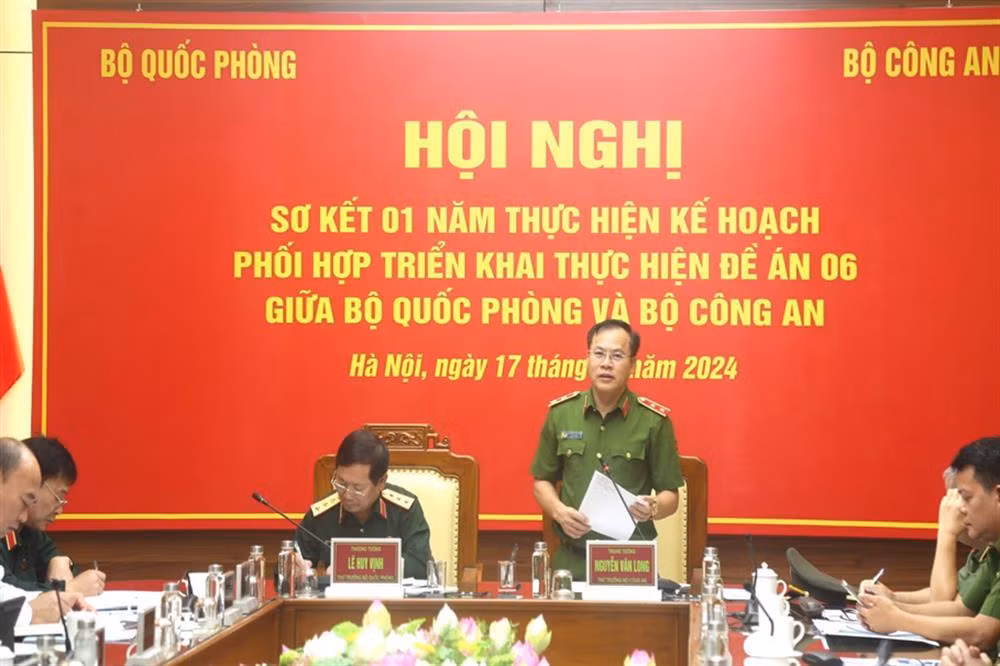 Ministry of Public Security, Ministry of National Defence review one-year of implementation of coordination plan to implement Project 06 -0