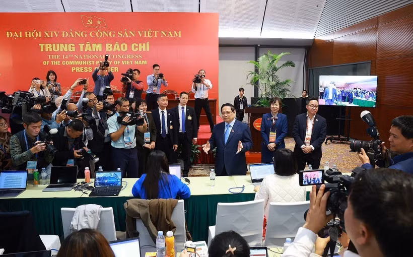 PM urges media to spotlight key outcomes of 14th Party Congress -0