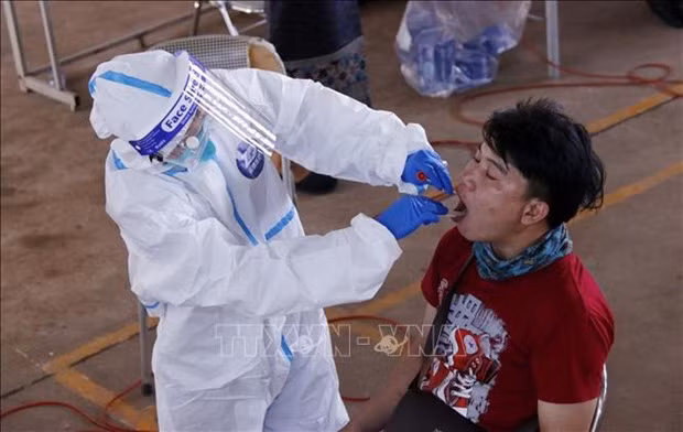 Laos intensifies pandemic prevention in capital, Malaysia to give booster shots -0