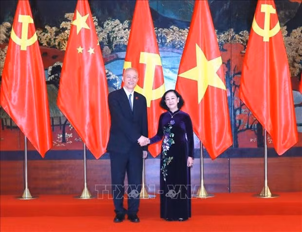 Vietnam gives top priority to developing ties with China: Party official -0