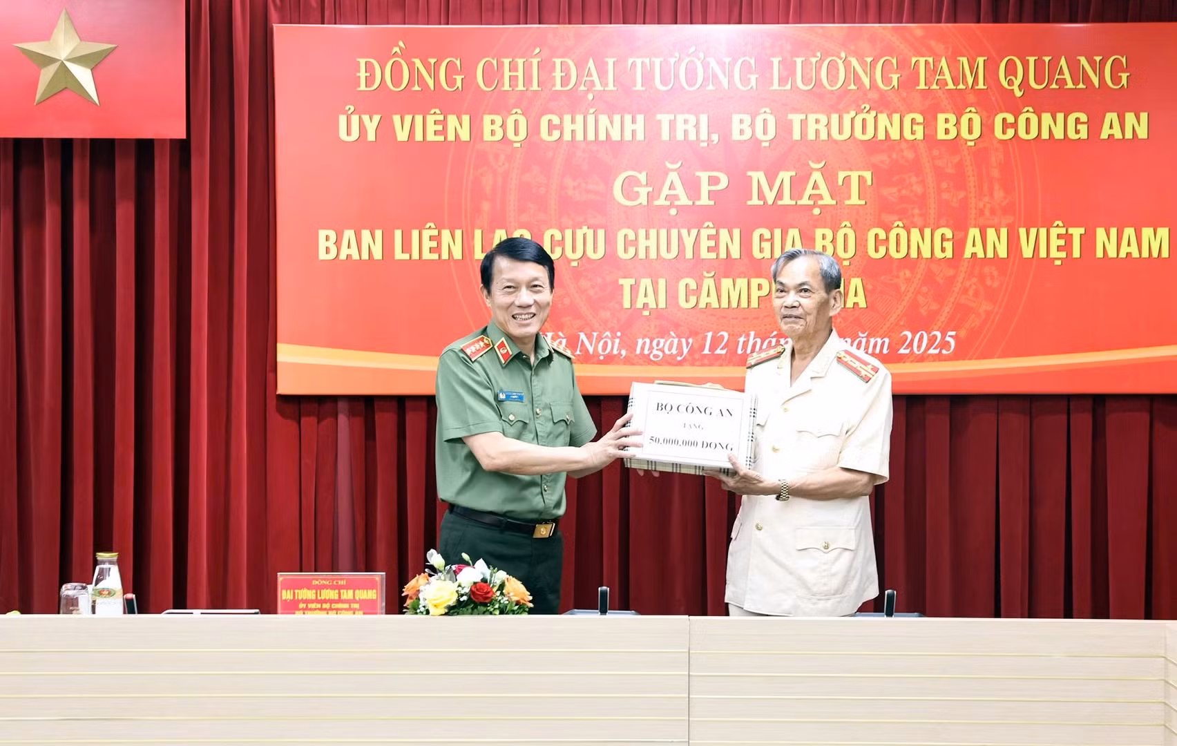 Minister Luong Tam Quang meets with former MPS experts in Cambodia -0