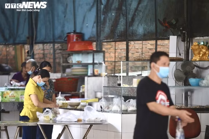 Cuong, the owner of a Pho (noodle soup) restaurant, says his family have all been inoculated with two doses of the COVID-19 vaccine and are eager to resume business operations.