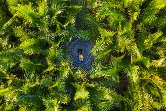 Local photographer wins silver at “Smile World” international awards ảnh 2 An image by photographer Phan wins the bronze prize in the documentary and travel category.