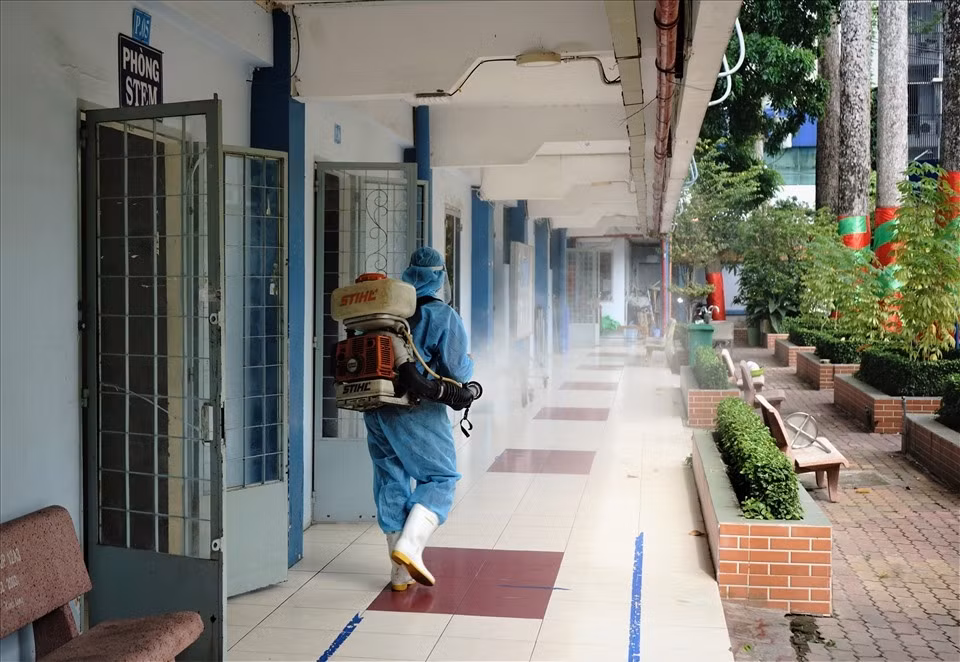 Nguyen Du high school had been used as an isolation area for COVID-19 patients in July and August of this year, meaning the disinfection process is rigorously carried out to ensure safety ahead of welcoming back students.
