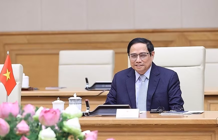 The Vietnamese Government chief outlines his views during talks with the Singaporean parliamentary leader.