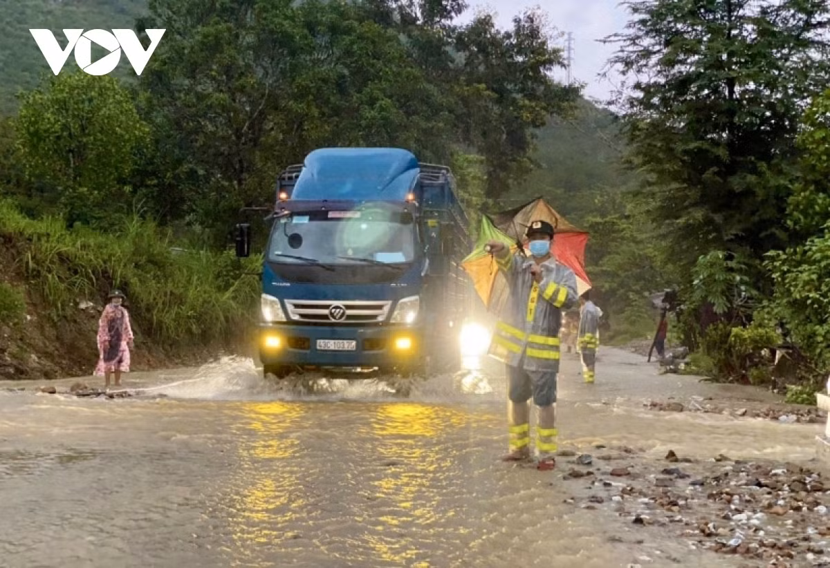 A traffic policeman provides guidance for vehicles as they travel on local roads.