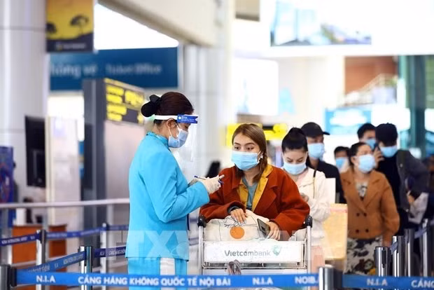 Passengers at Noi Bai International Airport in Hanoi