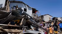 Typhoon Rai climbs as affected Filipinos ask for help