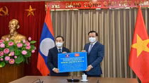 Hanoi supports Vientiane in fighting COVID-19