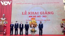 Vietnamese students begin new school year in person, online