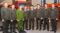 Delegates talk to reporters on the sidelines of the 77th National Public Security Conference