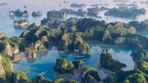 Visit the beautiful neighbor of Ha Long Bay