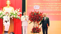 Senior Party members of Public Security Forces presented with 40-year and 30-year Party Membership badges