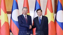 Lao Party General Secretary, State President congratulates Vietnamese counterpart