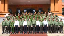 Minister Luong Tam Quang works with Lao Cai Provincial Police Department