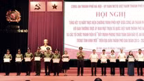 Hanoi police and Vietnam Fatherland Front review 10-year coordination