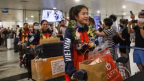 Vietnam women's football team welcomed home as heroes