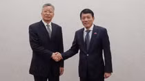 Deputy Minister Luong Tam Quang holds talks with Vice Minister of Justice of China