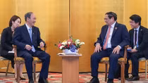 Government chief meets former Japanese PM