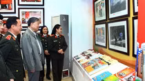 Minister To Lam visits the exhibition "People's Security Guard Force - 70 Years of Victory"