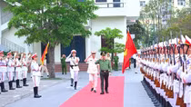 Minister Luong Tam Quang works with Thanh Hoa Provincial Police Department