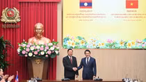 Minister Luong Tam Quang holds talks with Lao Minister of Public Security