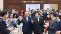 Top Lao leader briefs on outcomes of LPRP's 12th National Congress in Hanoi
