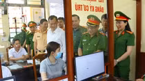 Deputy Minister Nguyen Van Long works with Nam Dinh police