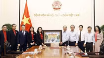 President asks Red Cross society to help the poor enjoy Lunar New Year