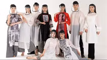 Local designer launches Ao Dai collection to honour frontline forces