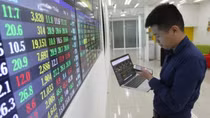 PM requests healthy operations of stock, corporate bond markets