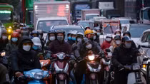 Locals rush back to Hanoi, HCM City after New Year holiday