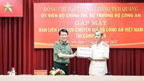 Minister Luong Tam Quang meets with former MPS experts in Cambodia
