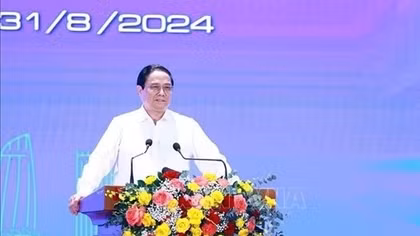 PM chairs conference to deploy NA's resolution on Da Nang's administration, development
