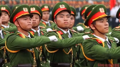 Minister Phan Van Giang and Minister To Lam review rehearsal of armed forces parade in celebration of Dien Bien Phu Victory