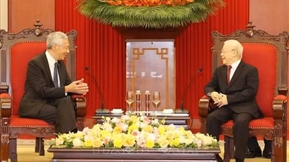 Party leader hosts Singaporean PM